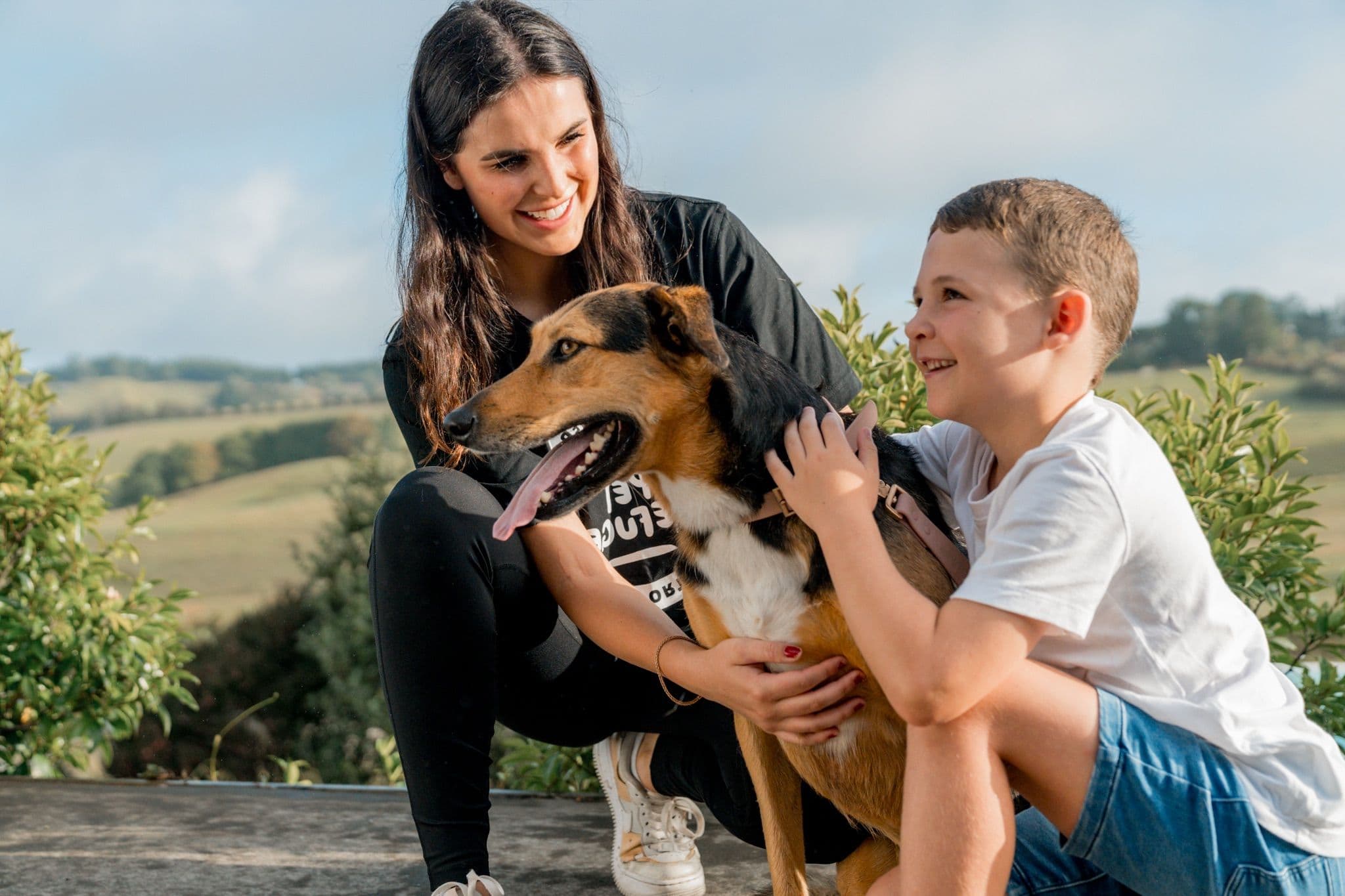 Dog, Pet Refuge staff and child